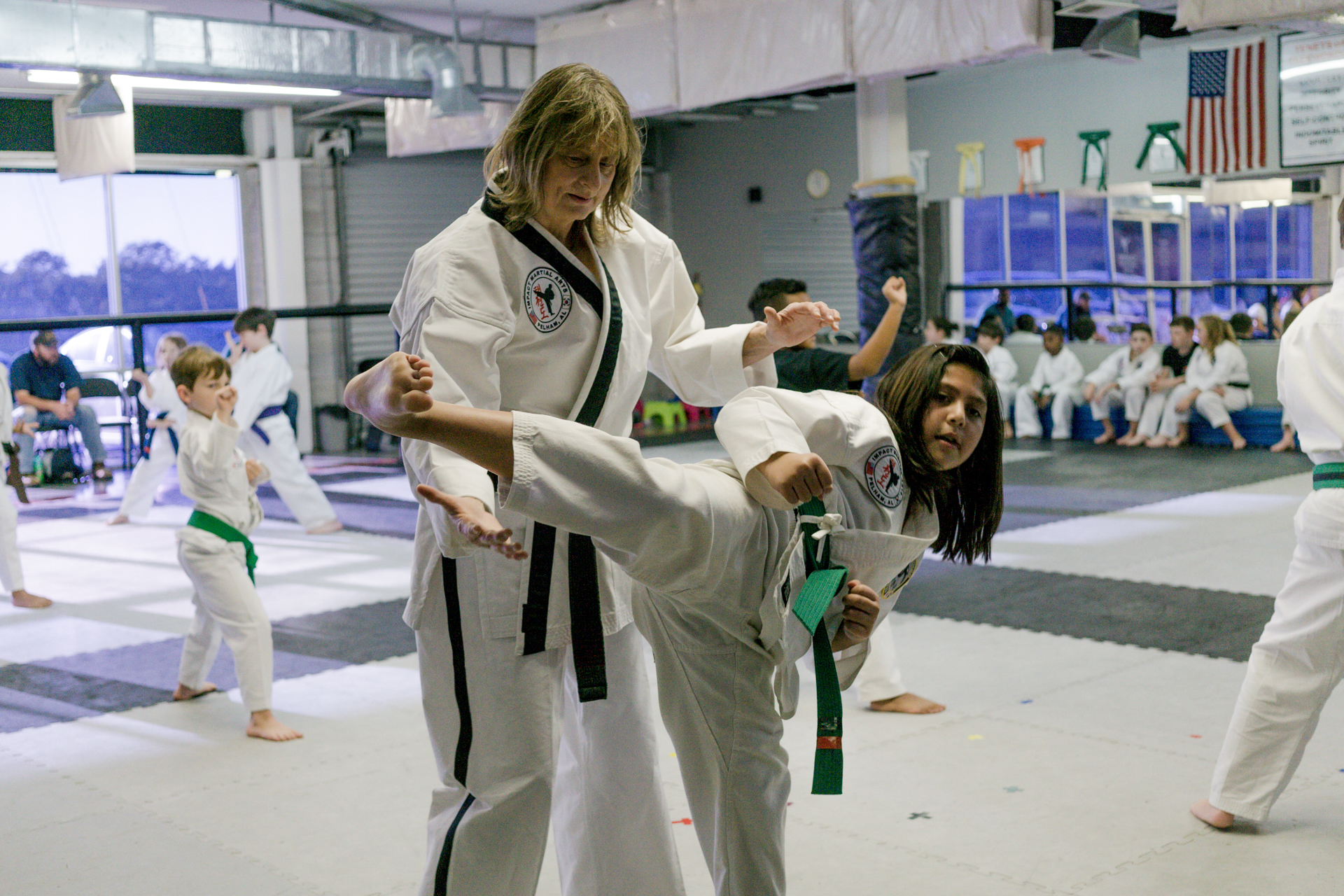 Karate kick Impact Martial Arts training classes